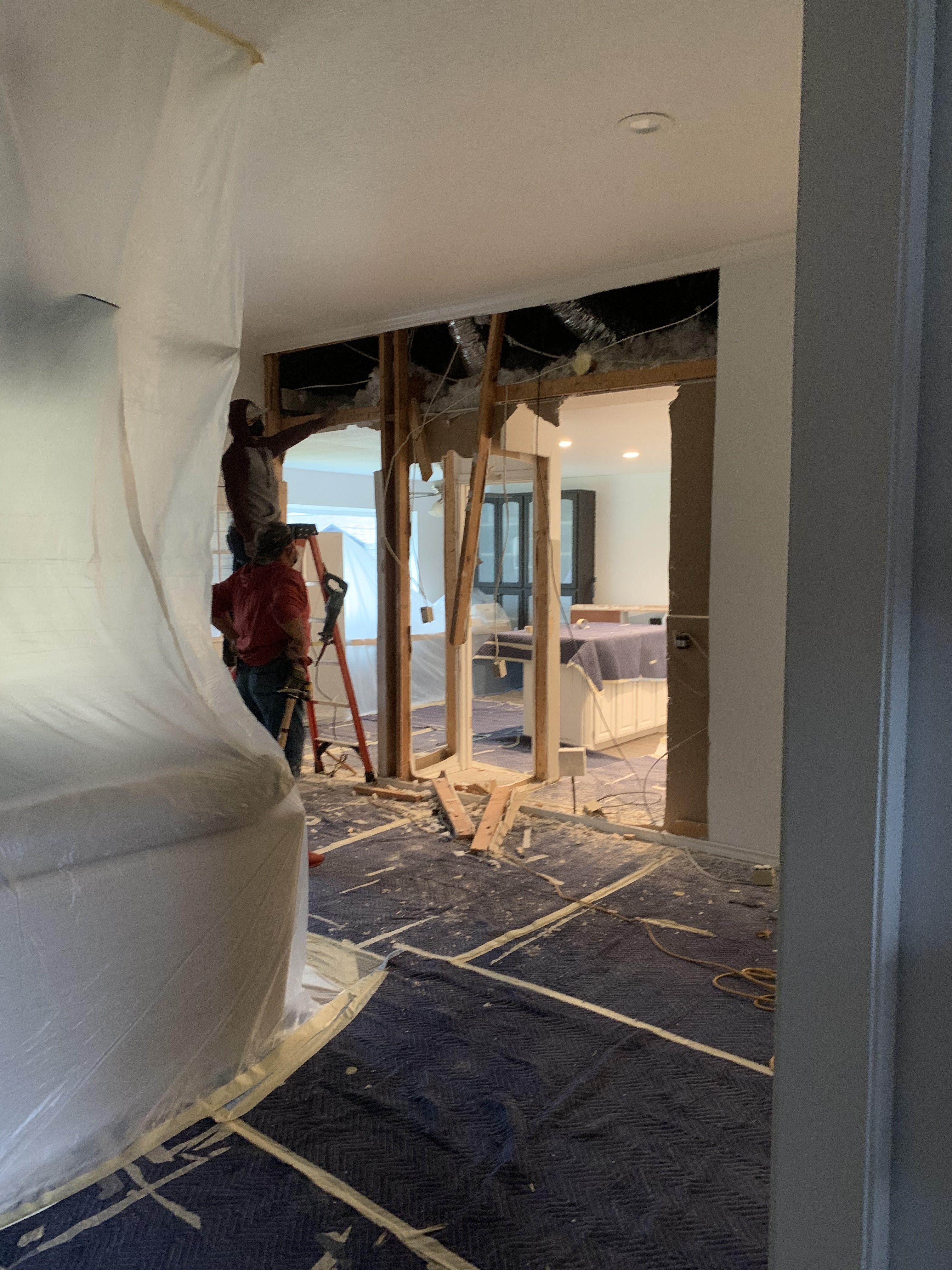 Kitchen before and during wall removal — Jonathan Orasanu review photo