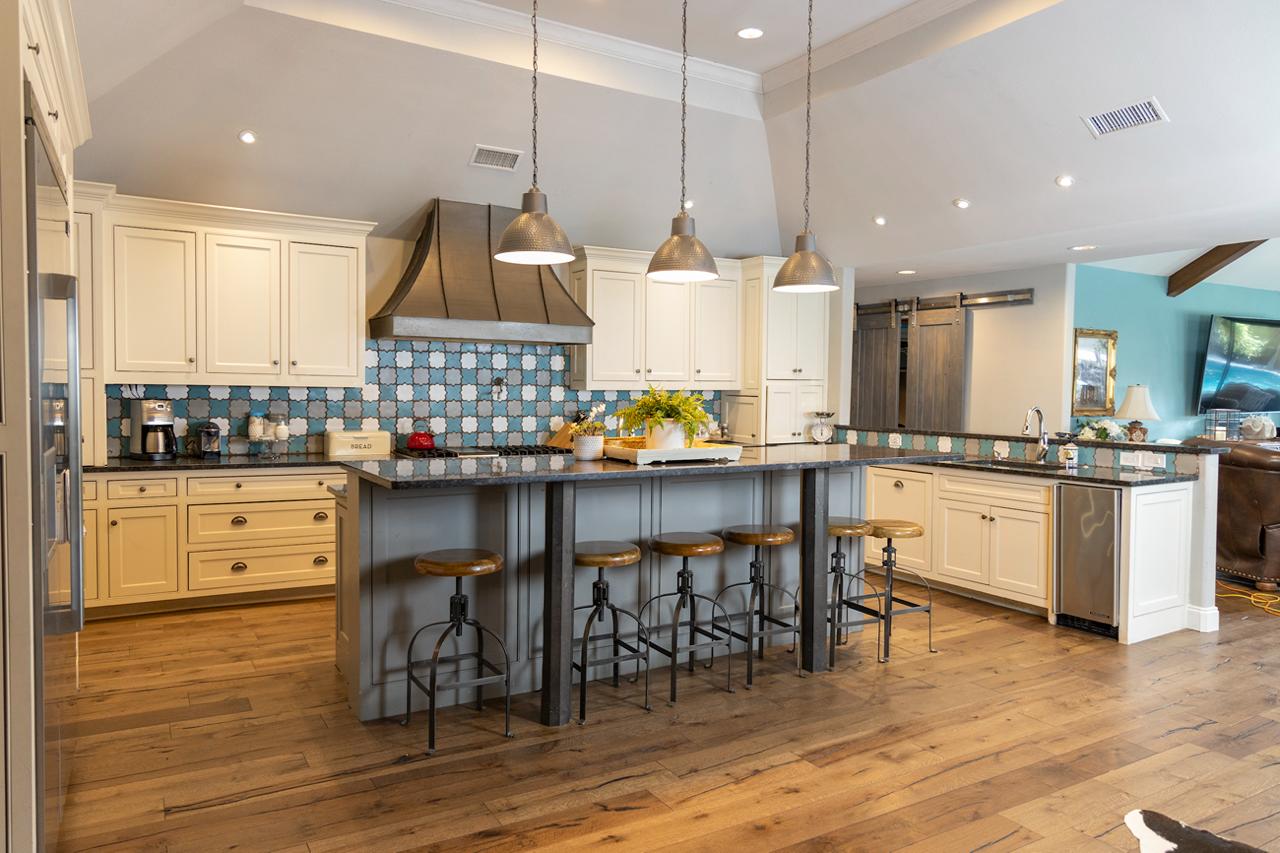 Kitchen island remodel with quartz countertops by RemodelIt Texas