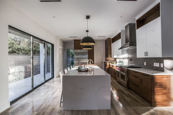 Wall to door conversion before and after — kitchen to patio glass door transformation Texas